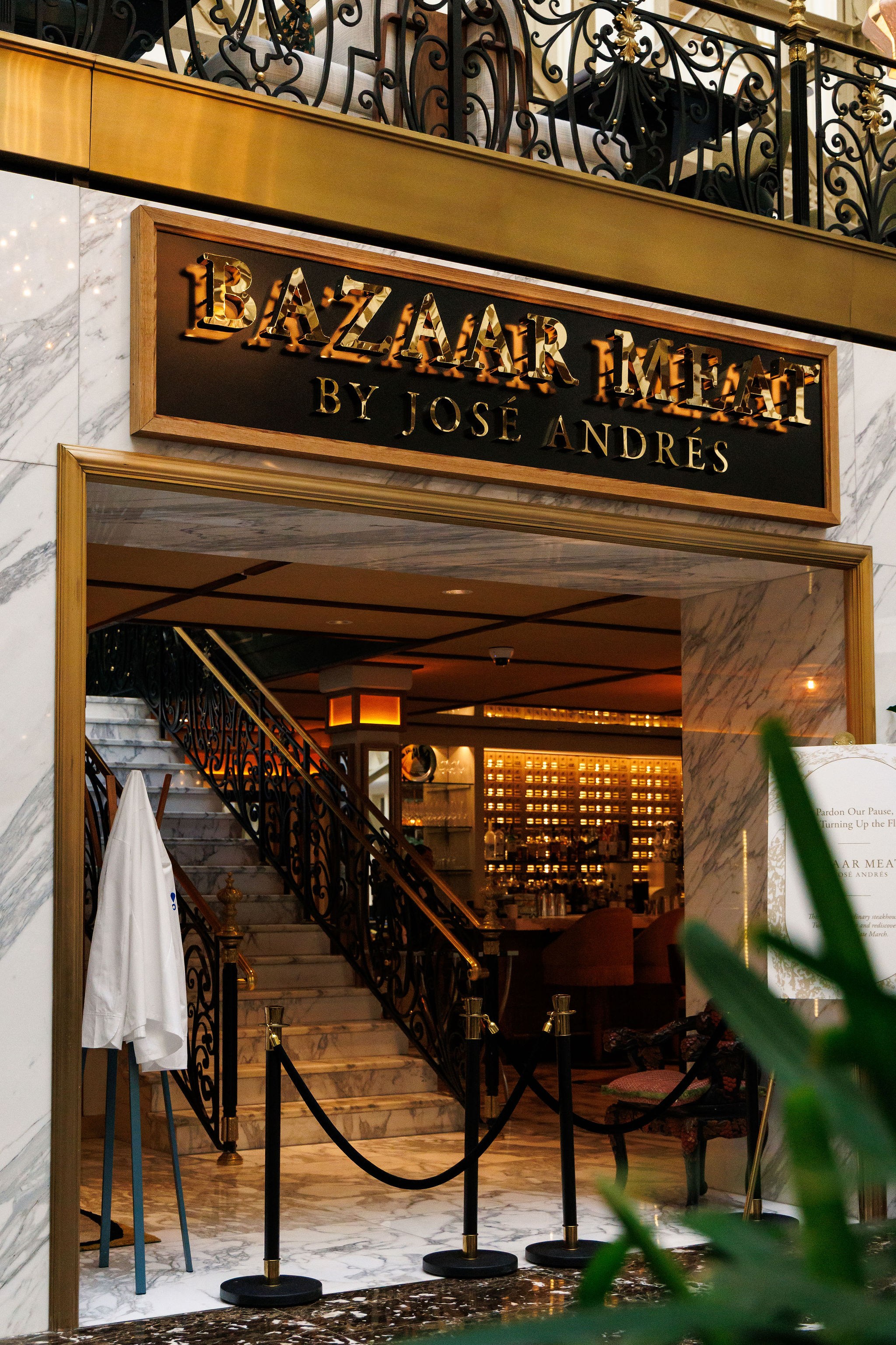 BAZAAR MEAT BY JOSÉ ANDRÉS: The entrance to the DC restaurant, featuring marble and ornate ironwork.