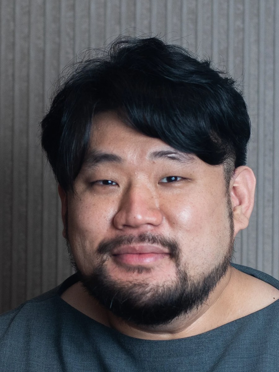 Hasung Lee, chef behind Oyatte, smiles in a portrait.