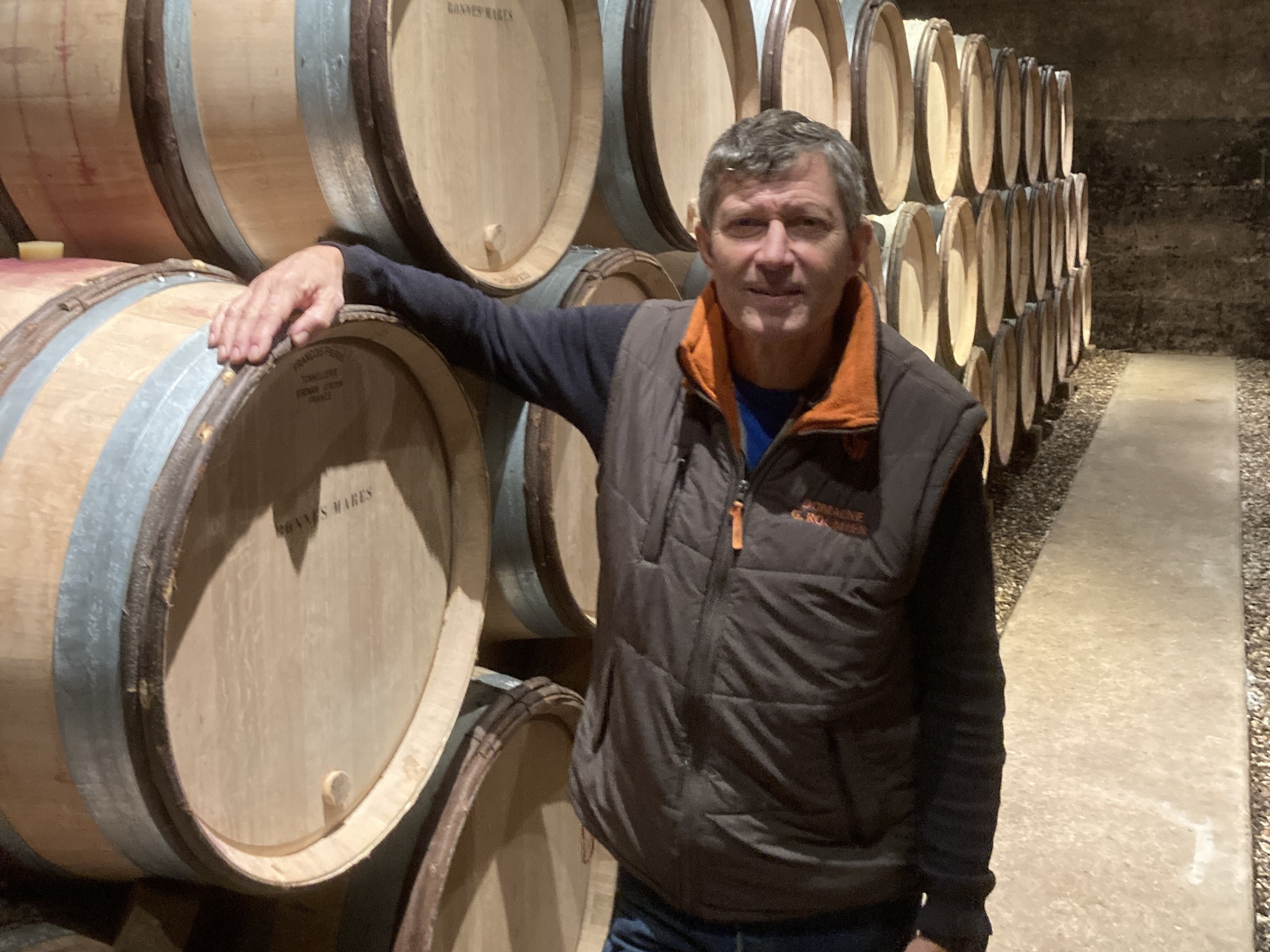 Christophe Roumier among the Bonnes-Mares barrels in the Domaine Georges Roumier cellar (via The Fine Wine Review)