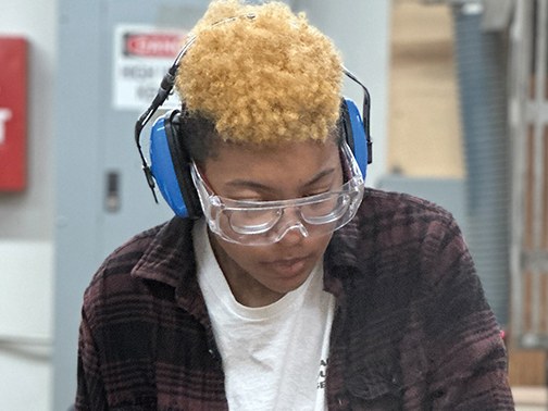 A student works a table saw at the North Bennet Street School in Boston.