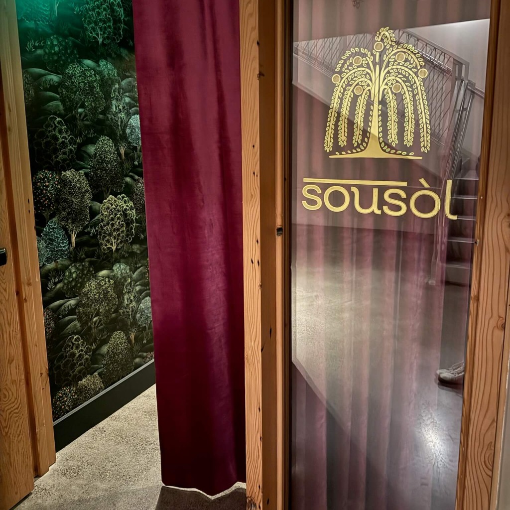 A door leading to a speakeasy bar