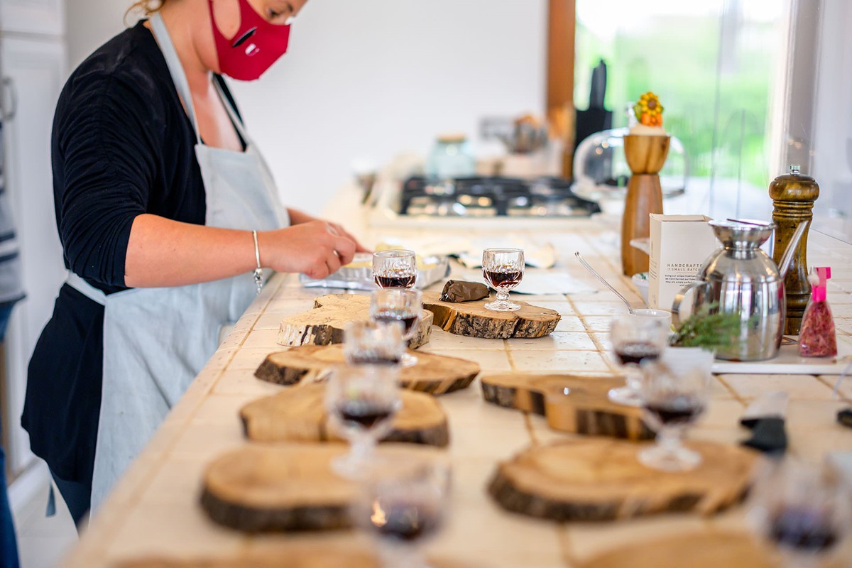 A woman preparing dishes with truffles