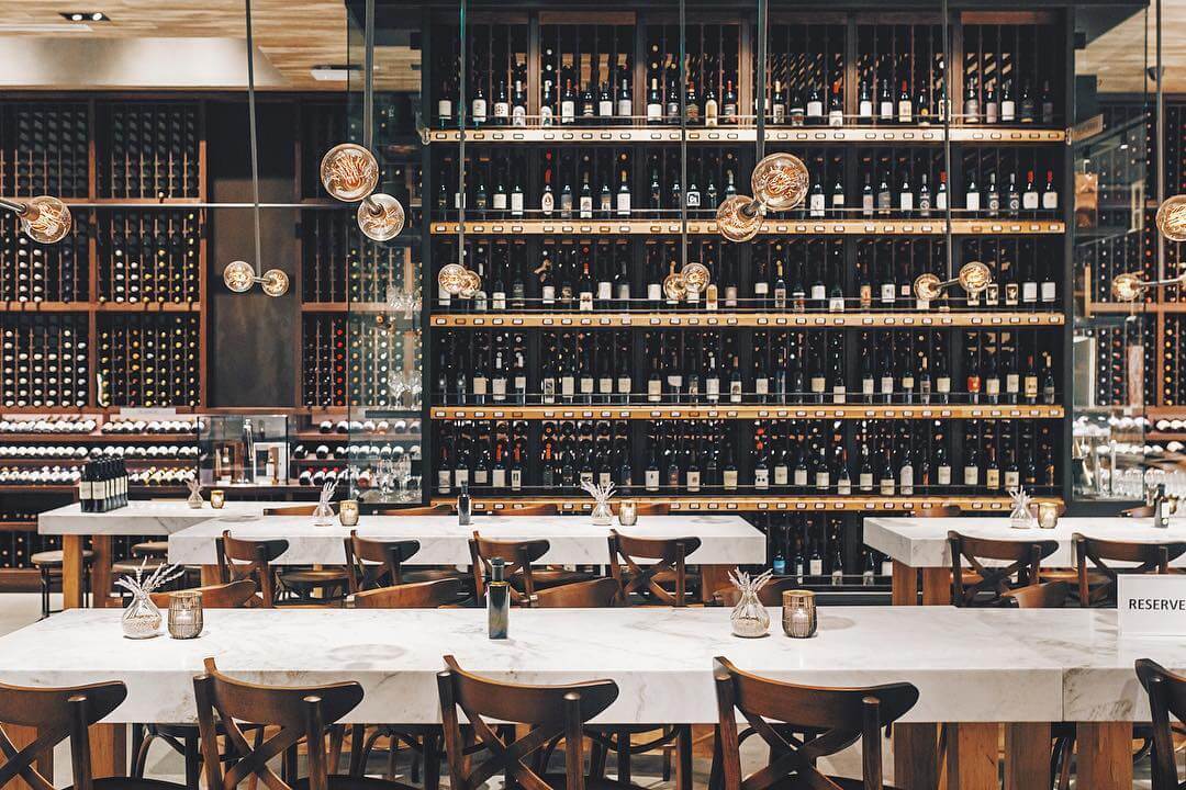 Wally's Beverly Hills' communal high tables