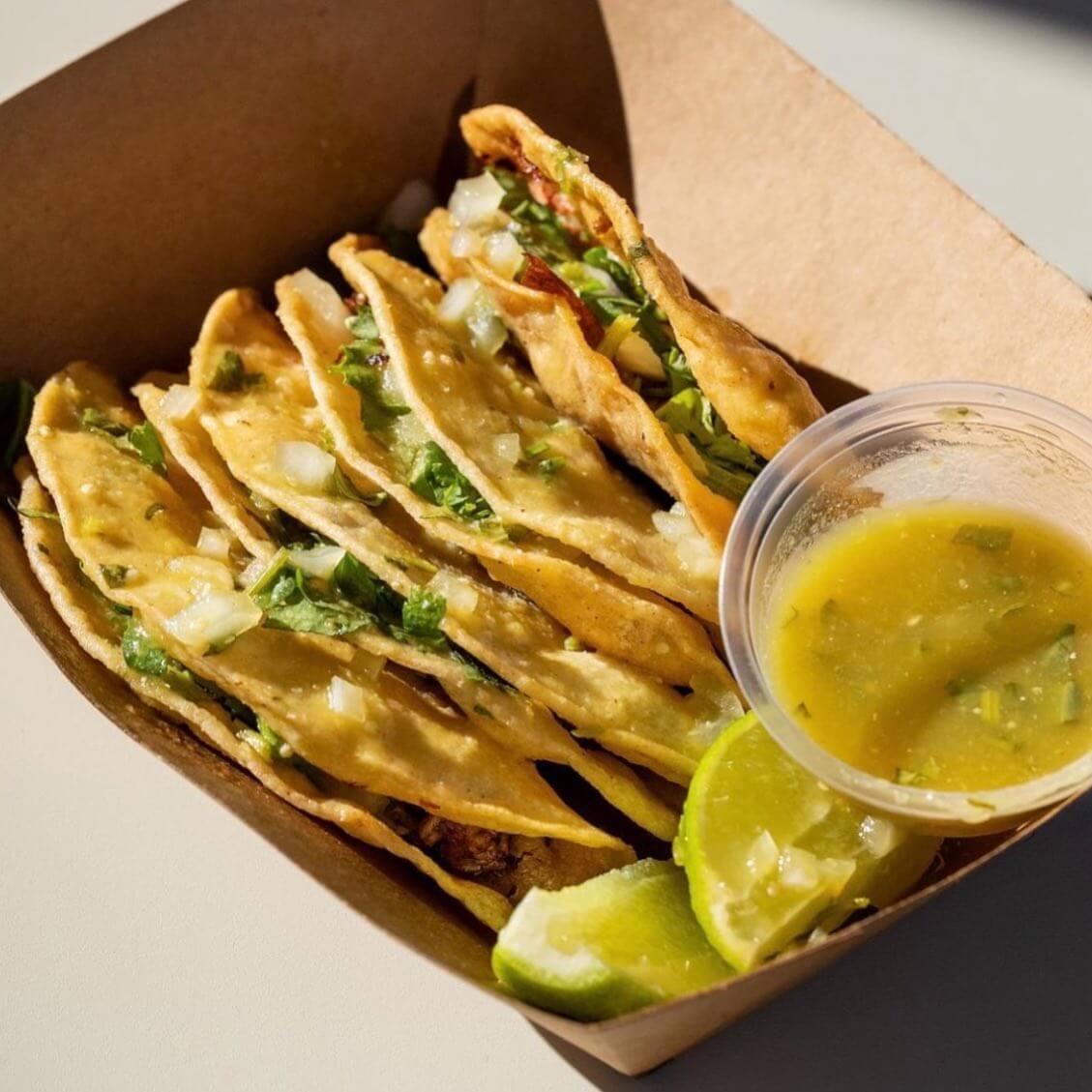 Tamales Elena y Antojitos' perfectly portioned, crispy fish tacos (pescadillas) filled with stewed fish, cilantro and onion.