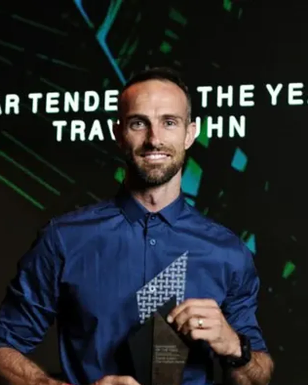 Portrait of Travis Kuhn