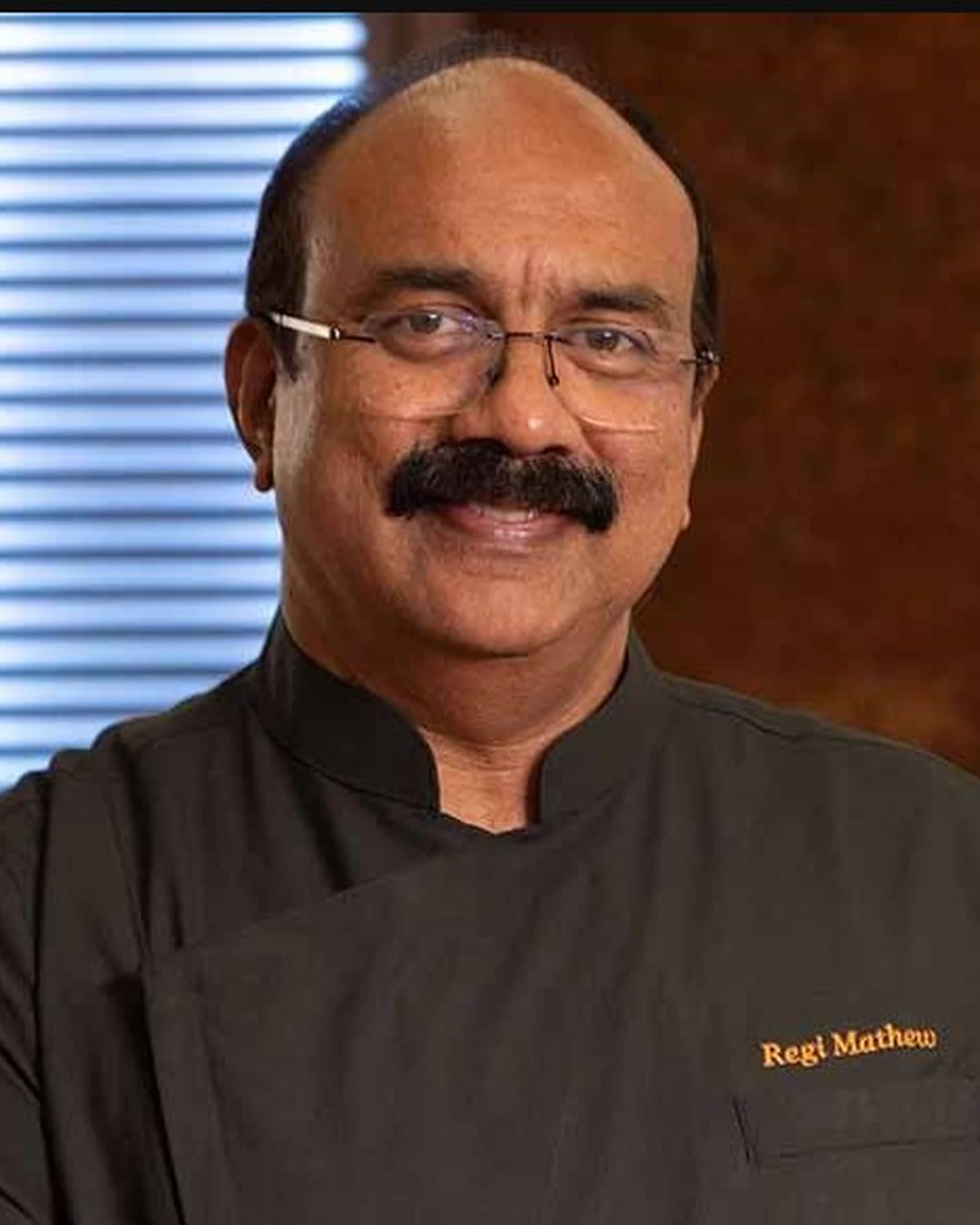 Portrait of Regi Mathew