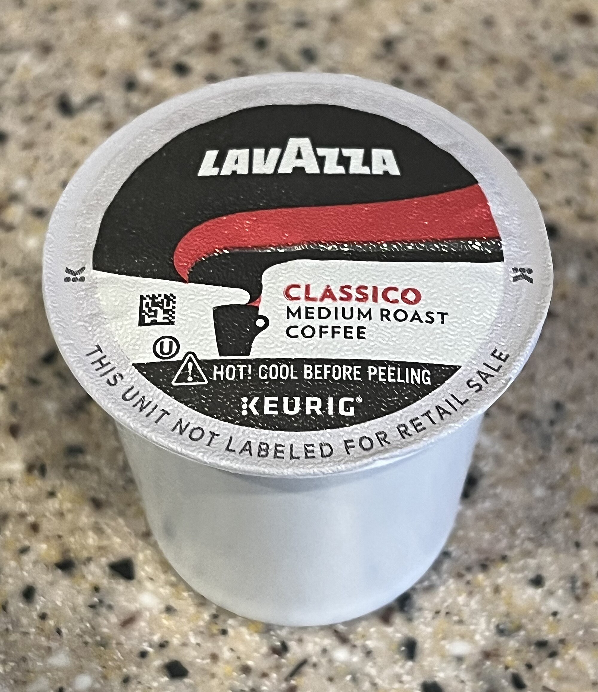 A Lavazza Classico medium roast coffee pod