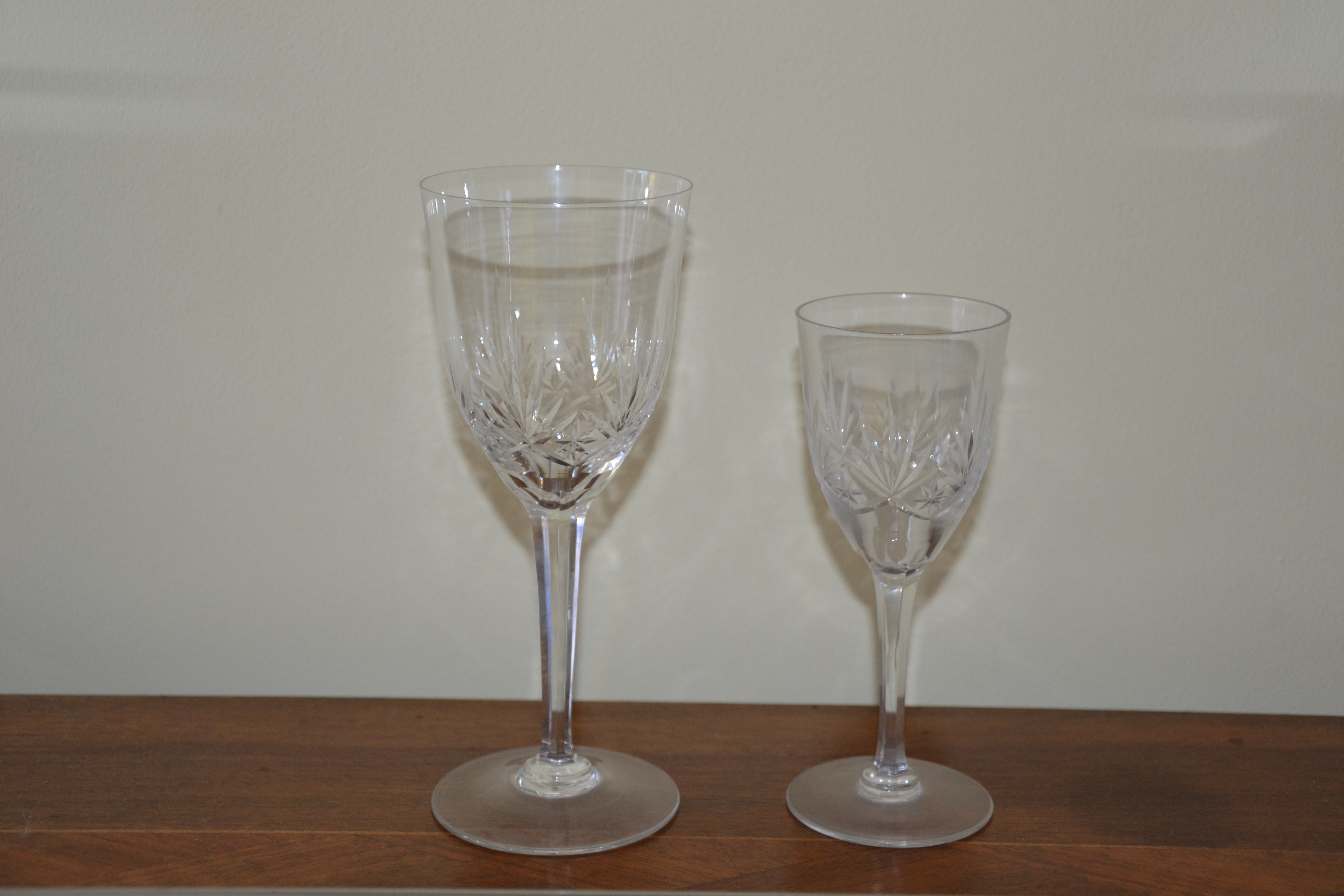 Two cut-crystal stemmed glasses produced by Saint-Louis