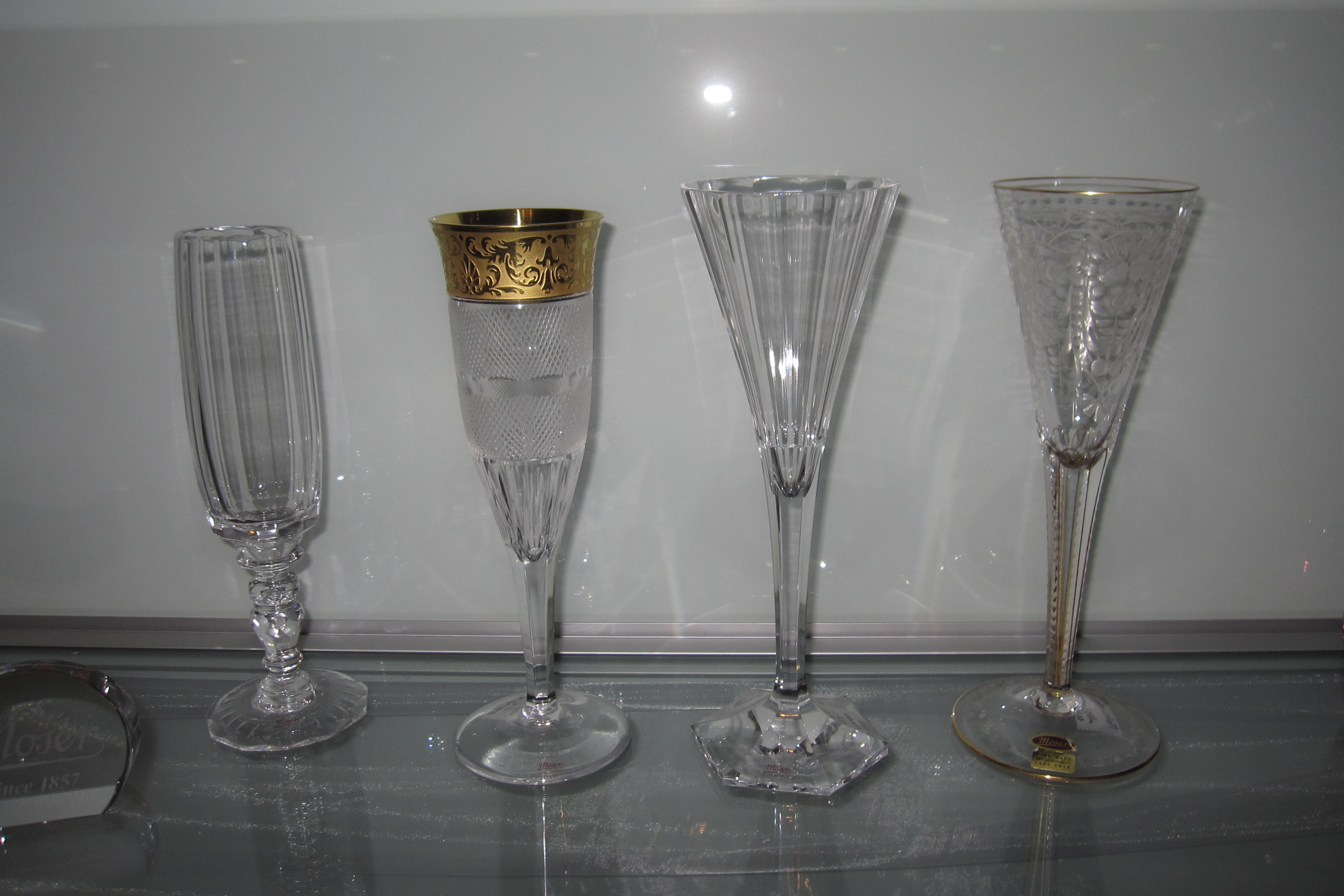 Four Moser Champagne glasses, including Maria Theresia, Splendid, and Maharani designs
