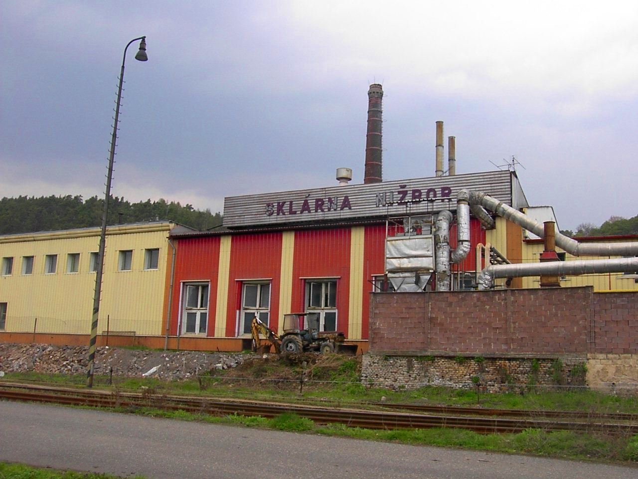 The Rückl glassworks industrial building beside the railway in Nižbor